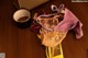 A purple and yellow lingerie sitting on top of a wooden table.